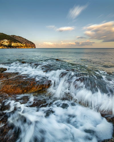 Coast with cliffs and waves